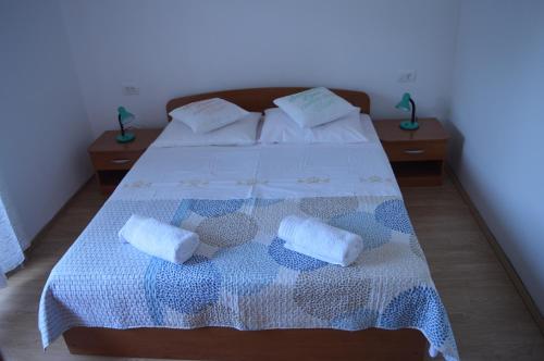 Postel nebo postele na pokoji v ubytování Koko