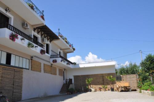 a view of a house with a driveway at bed & breakfast Local Living Edi in Berat