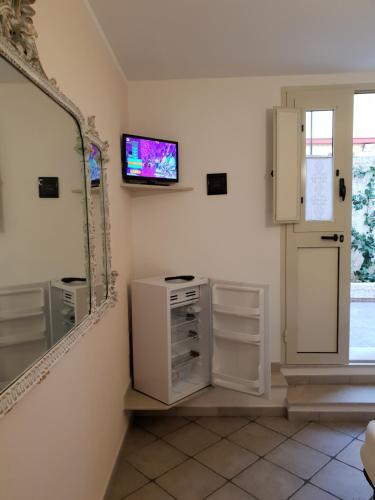 A television and/or entertainment centre at Teodora House