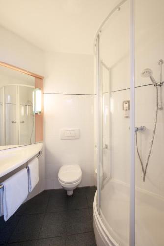 Ванная комната в Hotel Ibis Łódź Centrum