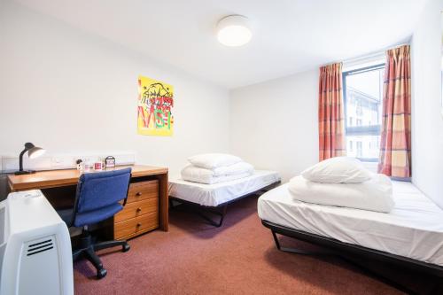 A bed or beds in a room at Euro Hostel Edinburgh Halls