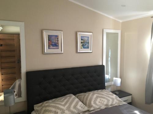 Posteľ alebo postele v izbe v ubytovaní Masanda Luxury Apartments