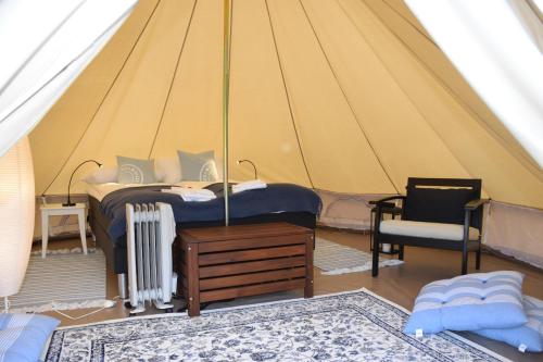Letto o letti in una camera di Døsen Gård