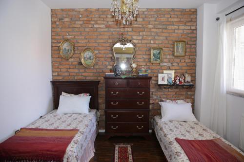 Postel nebo postele na pokoji v ubytování Apartment Nesti in Pristina Kosovo