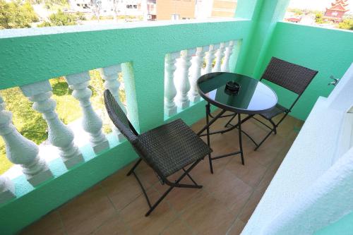 Ein Balkon oder eine Terrasse in der Unterkunft Green Resort