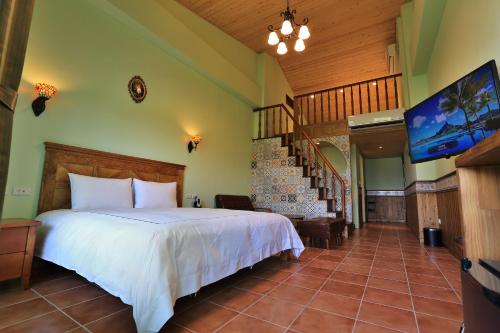 Ein Bett oder Betten in einem Zimmer der Unterkunft Green Resort