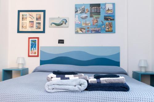 Łóżko lub łóżka w pokoju w obiekcie Casa Mira Parasio