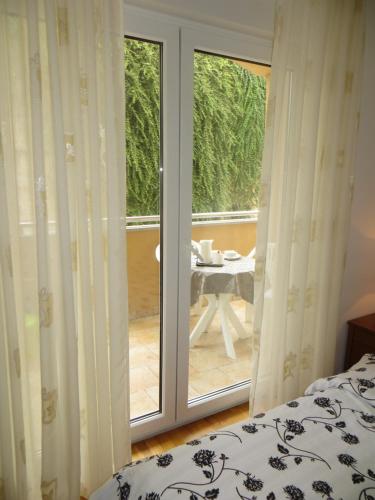 Postel nebo postele na pokoji v ubytování Apartman Mario
