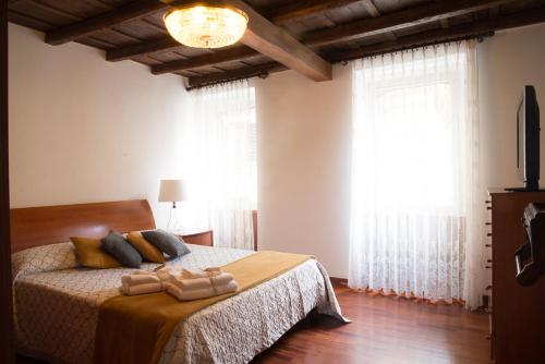 Кровать или кровати в номере A Casa di Giulia