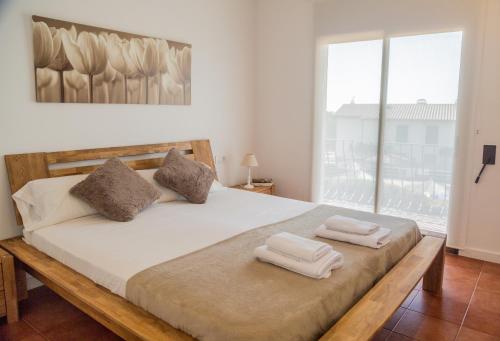 Cama o camas de una habitación en Empordà Residencial