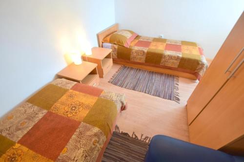 Ένα ή περισσότερα κρεβάτια σε δωμάτιο στο Apartment Valter