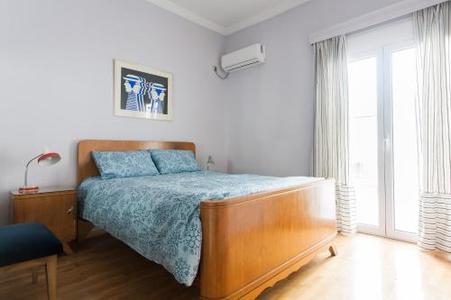 Posteľ alebo postele v izbe v ubytovaní Athens Vintage Apartments - Ilisia