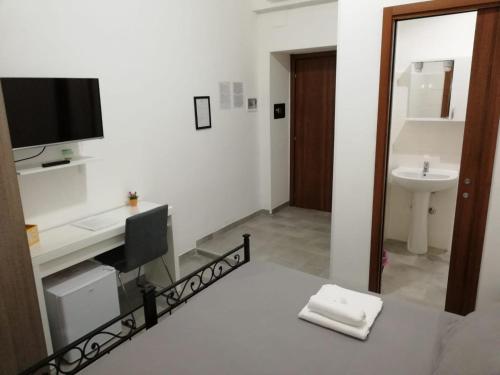 A bathroom at Grandis Rooms