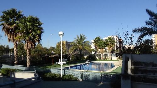 Bazén v ubytování Aпартаменты в San Juan Playa nebo v jeho okolí