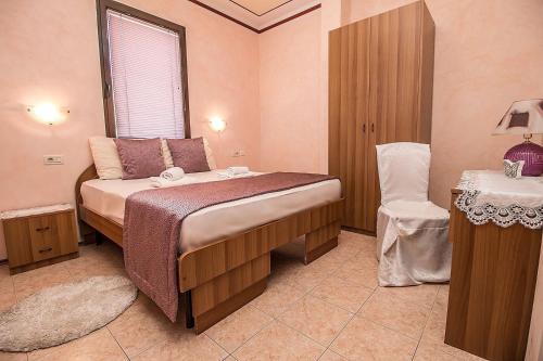 Un pat sau paturi într-o cameră la Villa Rose 2