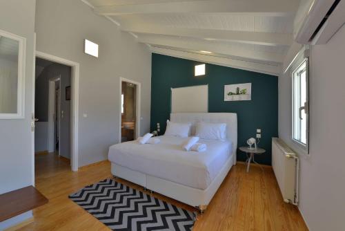 מיטה או מיטות בחדר ב-Villa PortoMare