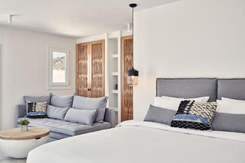 Postel nebo postele na pokoji v ubytování Boho Private Luxury Suites