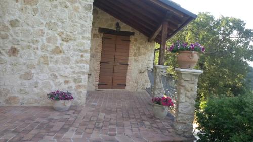 Κήπος έξω από το Agriturismo Isola Verde