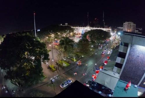 an aerial view of a city street at night at Suites Las Plazas in Cuernavaca