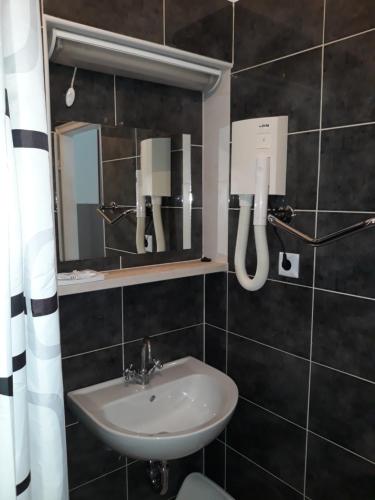Koupelna v ubytování Apartmani Lana Rab