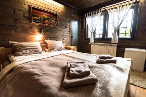 Säng eller sängar i ett rum på Banskovilla Zlateva House
