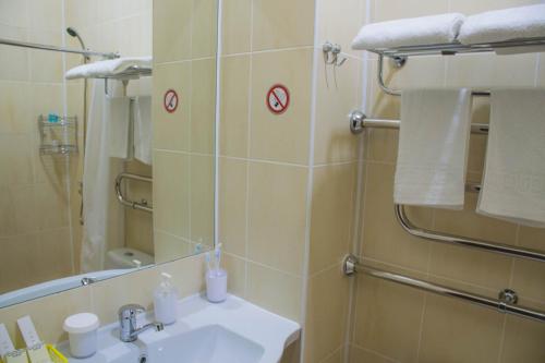 
Ванная комната в Белый Берег загородный отель

