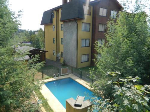 Bazén v ubytování Departamento Pucon nebo v jeho okolí