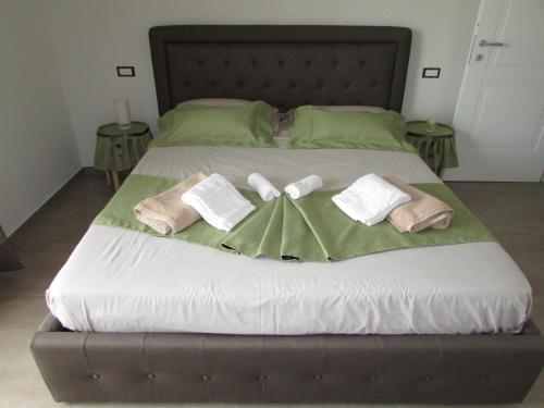 Ένα ή περισσότερα κρεβάτια σε δωμάτιο στο B&B Bellavista