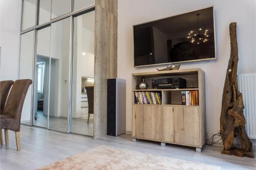 TV a/nebo společenská místnost v ubytování Premium Apartment Centrum