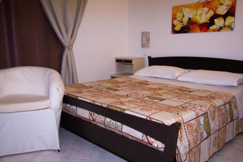 Postel nebo postele na pokoji v ubytování Noto Bedda Bed&Breakfast