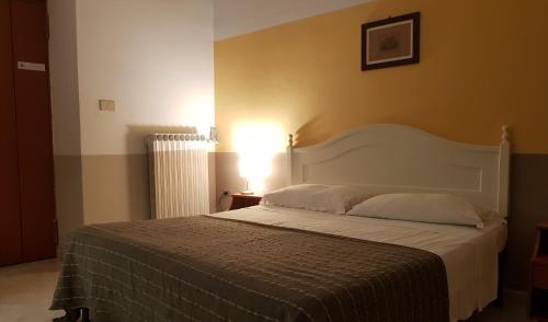 Llit o llits en una habitació de Dreaming of Naples