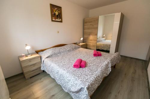 Postel nebo postele na pokoji v ubytování Amela
