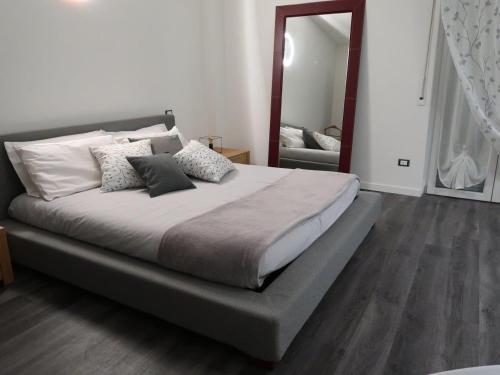 A bed or beds in a room at Romeo&Juliet's Nest in Verona