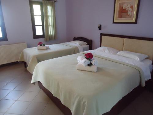 Postel nebo postele na pokoji v ubytování Eden Hotel