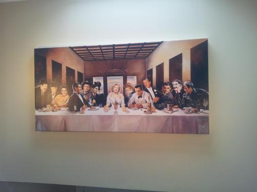 a picture of a group of people sitting around a table at Causeway Lodge in Bushmills
