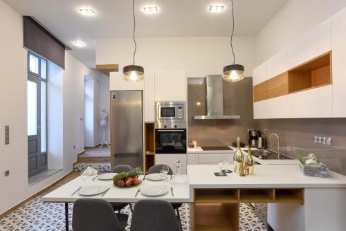 Η κουζίνα ή μικρή κουζίνα στο Residenza Rithymna Centro