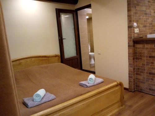 Ένα ή περισσότερα κρεβάτια σε δωμάτιο στο Low budget room with King Size bed