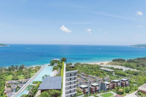 an aerial view of a resort near the ocean at Van-Pretty Residence Haitang Bay Sanya in Sanya