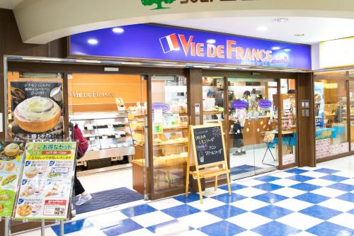 a store front of a wve de france store at Tokyo Aoto House in Tokyo