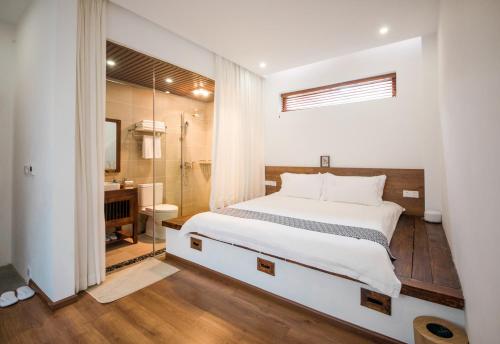 Dali Rong lu Hotelにあるベッド