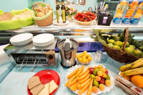 a refrigerator filled with different types of fruits and vegetables at Relais Parallelo 41 in Vieste