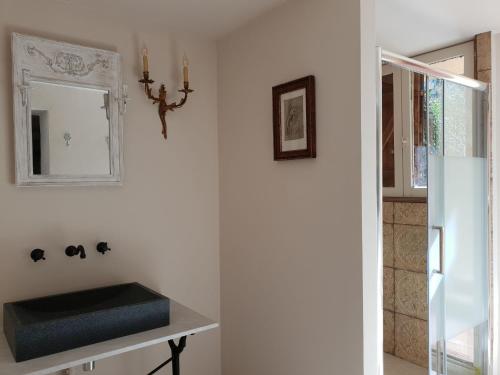 a bathroom with a sink and a mirror at Villa in Méounes near Bandol Beach in Méounes-lès-Montrieux