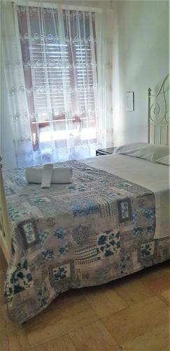 Ένα ή περισσότερα κρεβάτια σε δωμάτιο στο Hotel Provenza