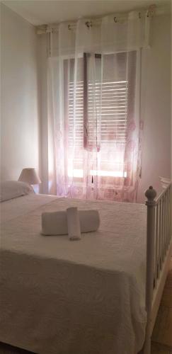 Ένα ή περισσότερα κρεβάτια σε δωμάτιο στο Hotel Provenza