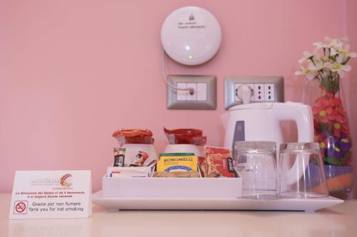a kitchen counter with a blender and some food at Relais Parallelo 41 in Vieste