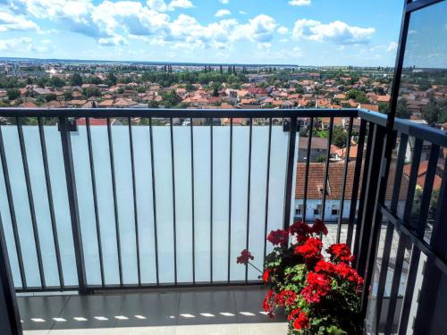 a balcony with a view of the water at Highsky Oradea Apartments in Oradea