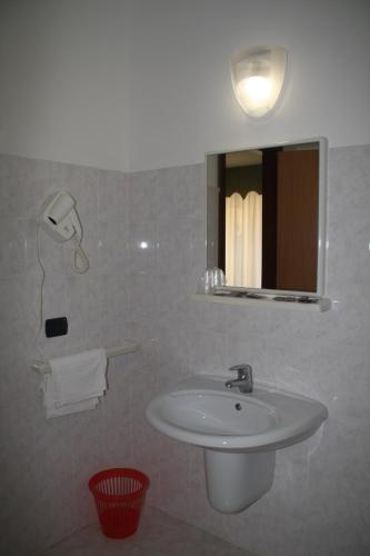 Ванная комната в Hotel Garden