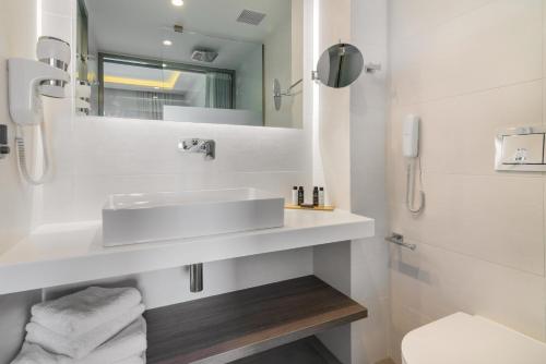 Koupelna v ubytování Hotel Palmyra