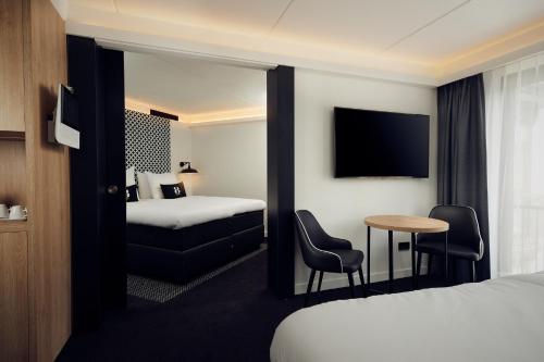 Voodi või voodid majutusasutuse Gr8 Hotel Oosterhout toas