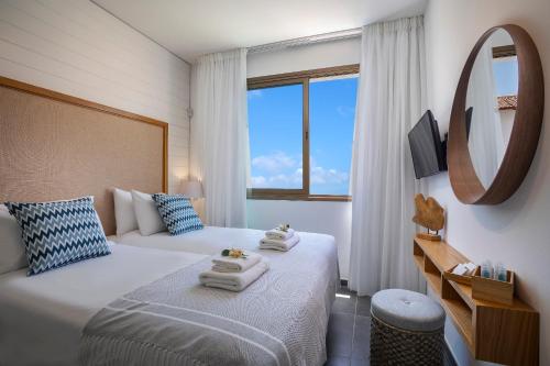 Ένα ή περισσότερα κρεβάτια σε δωμάτιο στο Chris Le Mare Luxury Villa